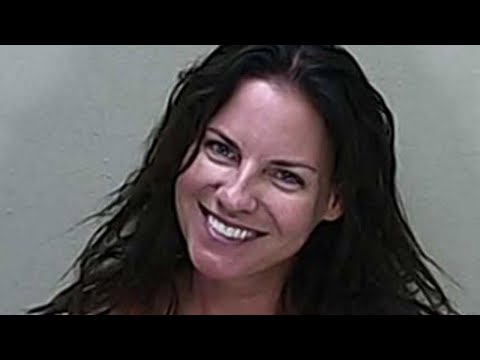 Florida woman gives smiling mugshot after being charged with killing a ...